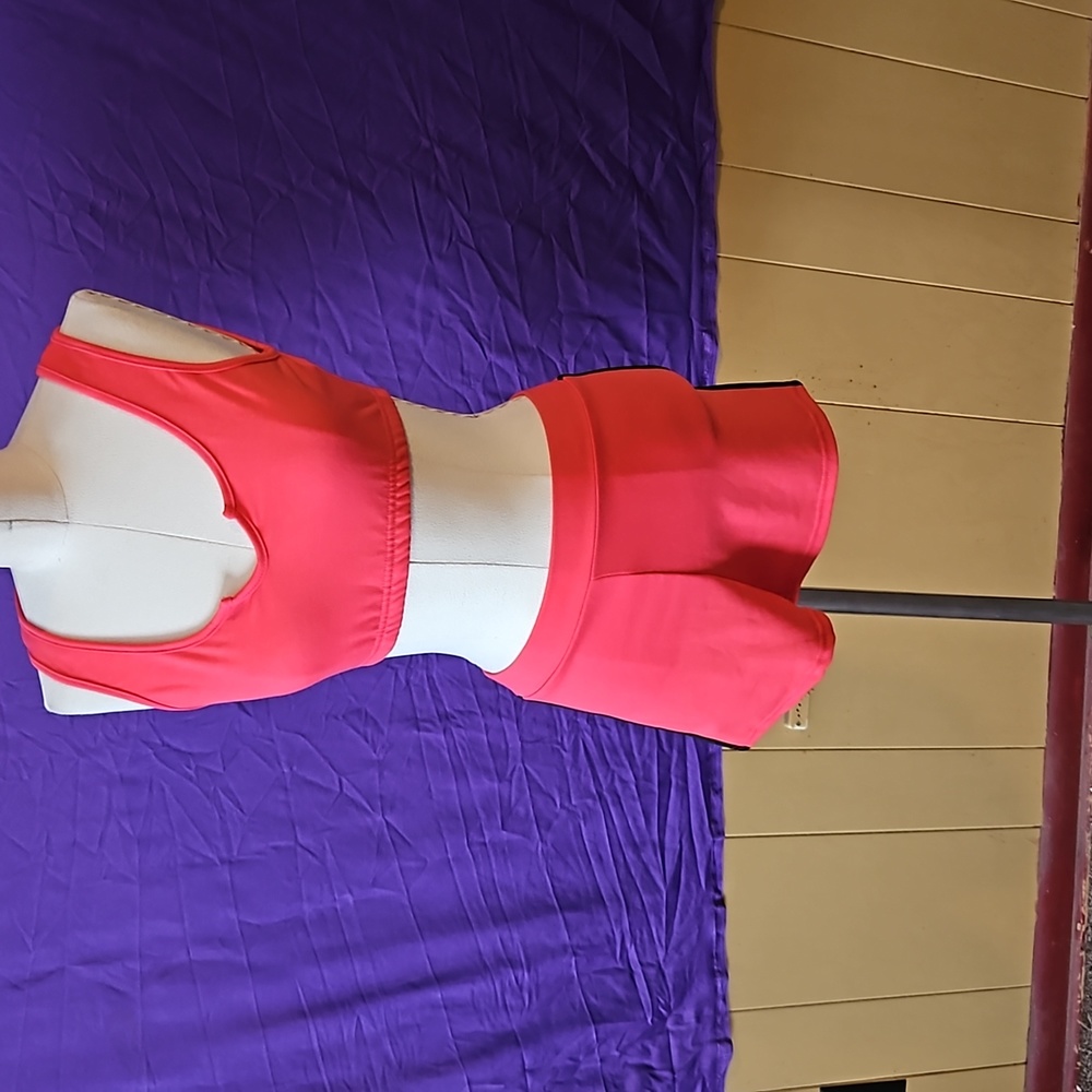 Two-piece coral colored workout set